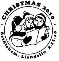 Postmark showing carol singers.